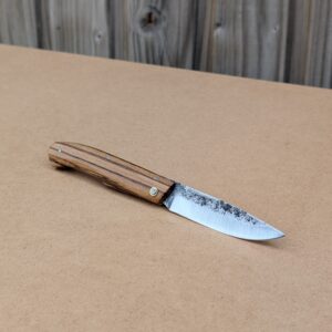 Le Nagha 422, couteau pliant en zébrano